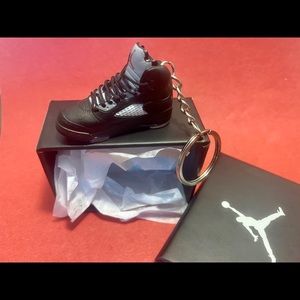 1 Air Jordan keychain, collector box.